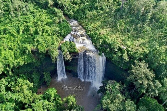 Boti Falls, Umbrella Rock, Aburi Gardens & Cocoa Farm Day Tour - Climbing Umbrella Rock above the forest