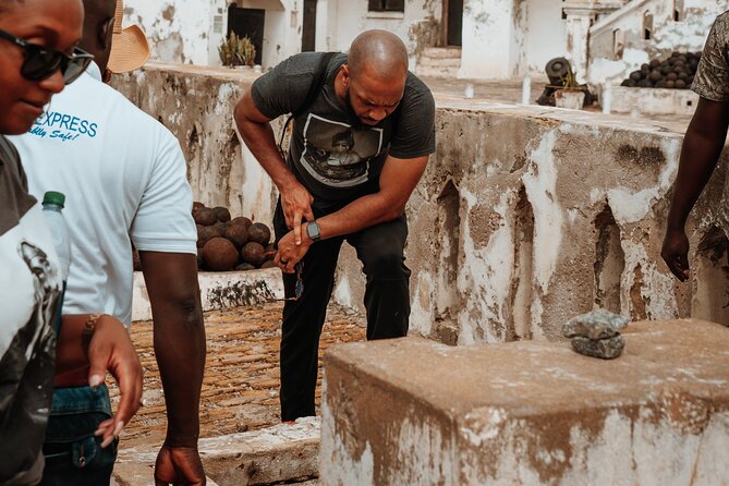 Cape Coast Castle, Assin Manso Slave River & Kakum Day Tour. - Cape Coast Castle and the hard questions it raises