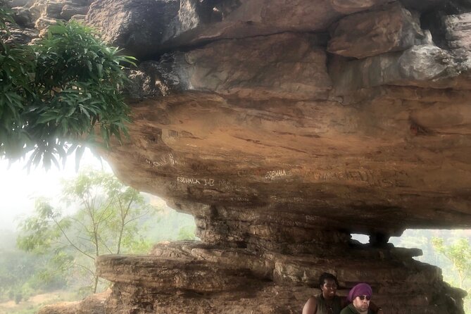 Experience Boti Waterfalls, Aburi Botanical Gardens & Tetteh Quarshie Cocoa Farm - Boti Falls, Umbrella Rock, and the three-headed palm